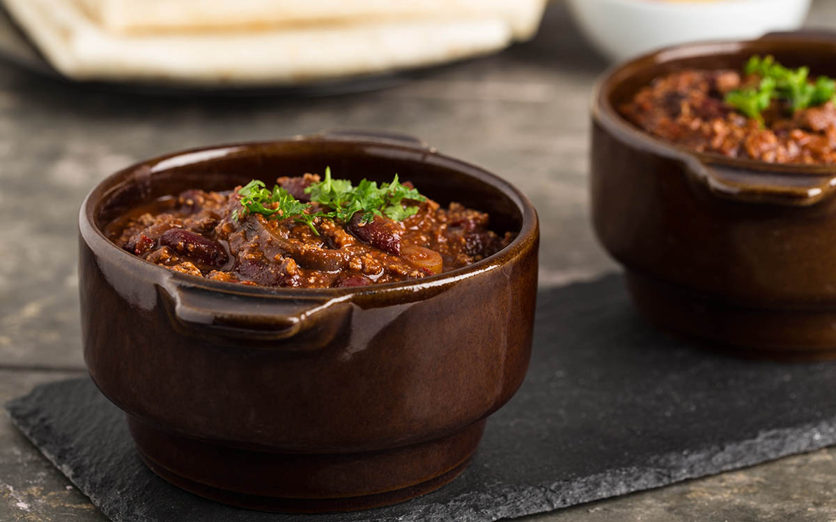 Stockfoto - Feuriger Bohneneintopf mit Sojafleisch und Chili.